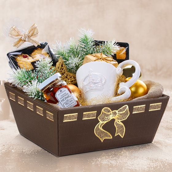 Panier cadeau « Exquisit » pour Noël avec du miel et des biscuits.