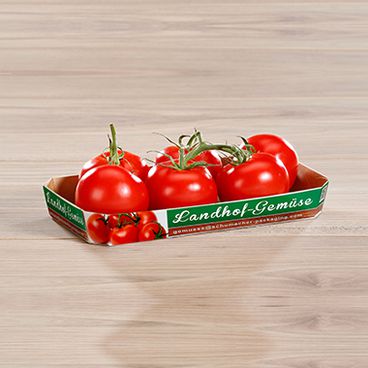 Barquette pour légumes blanche avec logo légumes de la ferme Landhof, remplie de tomates 650 g