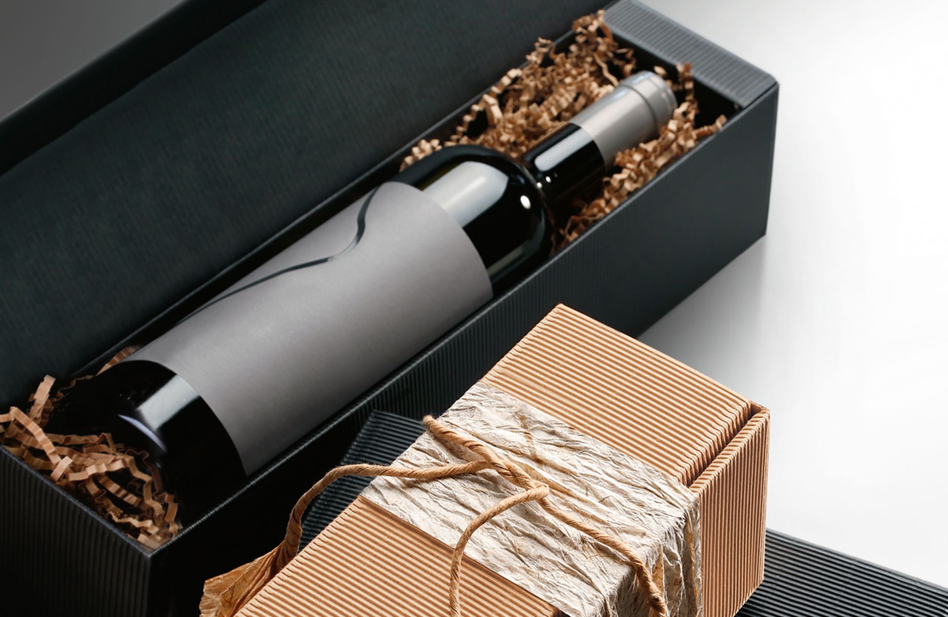 Gift packaging, single-face board series for bottles, in natural colour and anthracite